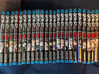 All 23 spines of the Demon Slayer Japanese manga set lined up in order, volumes 1 through 23, Jump Comics editions