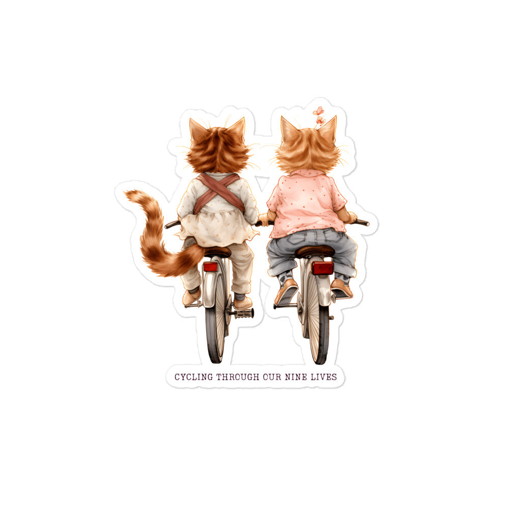 Cycling Through Nine Lives: Cute Cat Duo Sticker